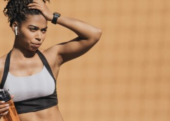 woman in workout clothes looking fit